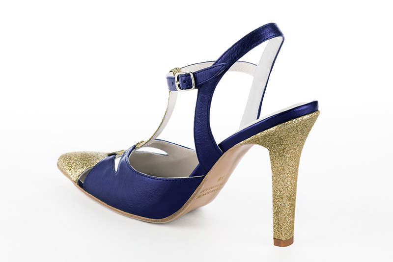 Gold and amethyst purple women's open back T-strap shoes. Tapered toe. Very high slim heel. Rear view - Florence KOOIJMAN